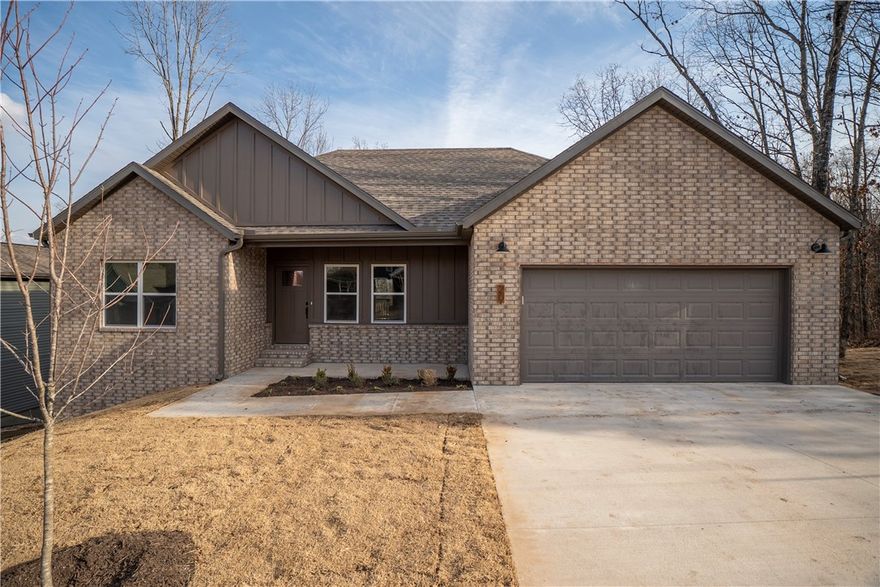 Beautiful new home with open living/dining/kitchen for your family's enjoyment. Granite countertops and island with white cabinetry. Electric logs in living area. Tile shower and walk-in closet in bedroom. Home has two flex rooms that would make a great office space, craft room, workout room, etc. Luxury vinyl plank throughout. Access to back covered deck off of kitchen area. Agent owned.