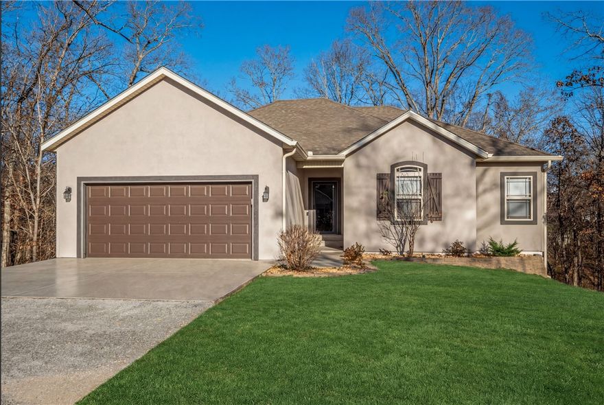 LOCATION!! 1/2 mile from the Back 40 Trail, 1 mile from Metfield Clubhouse, 4 miles from OZ Trails Bike Park, & 8 miles to AWSOM/Downtown Bentonville. This is the one for nature lovers, bike lovers, & Bella Vista enthusiasts! A rare gem on .38 acre, open back yard & partially wooded- completely renovated in the last 3 years. This 2,654sq ft home includes 3 bedrooms, 3 bathrooms, a walkout basement with custom bar and flex room. Enjoy every sunrise and sunset from the 48x12 covered deck (2023)- or from the hot tub on the downstairs patio! You have to see the upgrades! Soaker tub, 3 tiled showers, epoxy garage & driveway & patio, gas stove & fireplace. Washer, dryer, fridge, hot tub, & bar coolers convey. Also listed with two additional lots for a total of 1 acre- MLS #1331540. Open House: Sat, Jan 31, 2p-4p and Sun, Feb 1, 2p-4p