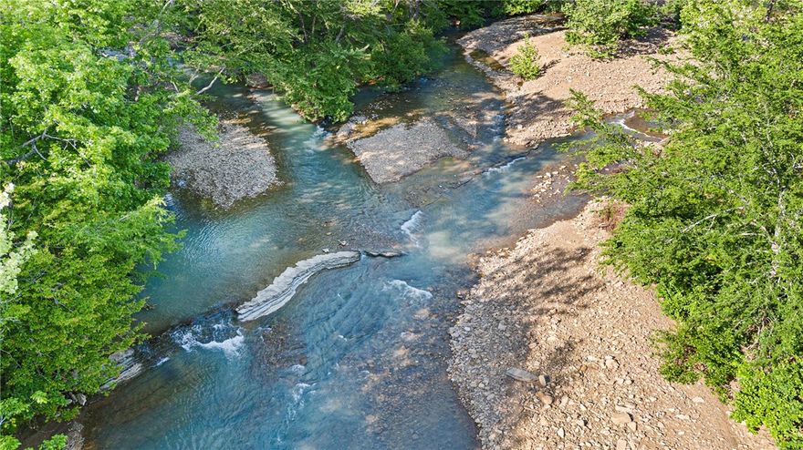 83 ACRES M/L and a quarter mile of the Little Mulberry Creek Ozark Paradise that also borders the  Ozark National Forest! Location, History and Natural beauty combine to make this a truly one of a kind property.  This special property hasn't been on the market in 20 years and is now ready to be your dream location! Whether you want to live in splendid isolation, or bring the family and friends to enjoy this unique property, is your choice. This property, Two newer homes, with five bedrooms and four baths combined, one historic cabin that dates from the settler days, a hunting cabin that can be turned to so many uses, and  4 wells on property consisting of  83 acres m/l bordering the Ozark National Forest, and the beautiful blue waters of The Little Mulberry and Friley Creek run right through this property! Just minutes from The Mulberry River, Byrds Recreation center, the famous Oark Store. A property like this rarely comes on the market and it can be yours! Don't delay, call today for your personal tour.