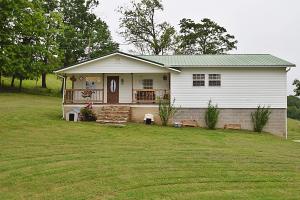 Enjoy the view off the front porch of this beautiful home situated on 45+ acres in Yardell, Newton County. This 4 bedroom 2 bathroom home is move in ready! The original part of this home was constructed in approx 1978, it has been remodeled and added on to in the 1990's and 2000's. Large living room would be a great gathering place for family and friends. This home has a large master suite with walk in closet. The split floor plan has an additional 3 bedrooms that are all large bedrooms. The 45+ acres is mostly pasture and ready for your cattle or horses. Don't miss out on this one!