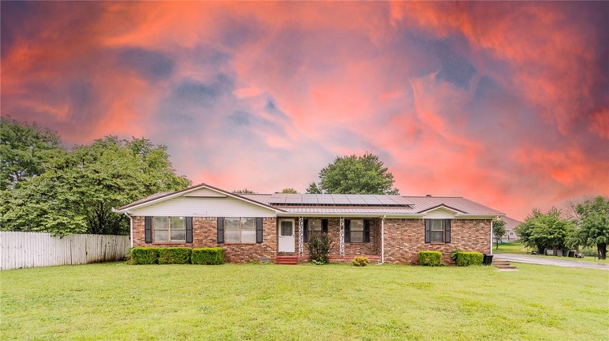 3 bed, 2 bath, and a bonus suite that includes it's own bath and kitchen. Use the bonus space for a place for family to stay or even a rental apartment. This property is a great option for multi-generational living!  Fenced in backyard, and on a corner lot this property is a must see! It's not often that you can find a full suite with it's own private entrance. This house is within walking distance to the local library, walking trail, splash pad, and senior center. A location that has so much to offer! Oh! Don't forget the solar panels (paid off at closing), and the metal roof! The home has storage shed too!