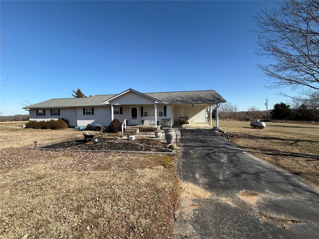 3 bedroom, 2 full bath level yard, 1 car carport.