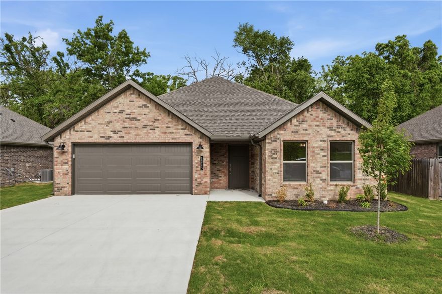 Brand new construction in the heart of Gentry! This all-brick 3-bedroom, 2-bath home offers quality finishes and a functional layout designed for everyday living. Features include LED lighting, tray ceilings, 3 cm granite countertops, Frigidaire Gallery appliances, durable LVP flooring throughout main areas, full aluminum guttering, and more. Conveniently located with easy access to all that Northwest Arkansas has to offer—shopping, dining, and commuting routes—this home is the perfect blend of comfort, style, and location.