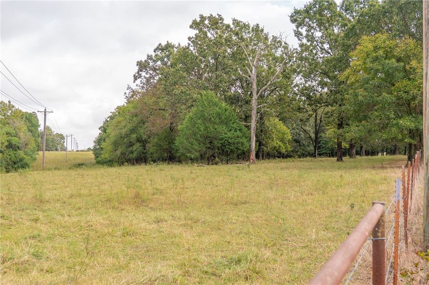 Acreage near XNA provides endless potential! Level land in fast-growing area is perfect for residential development, small farm or cattle operation, or commercial use. This prime location plus open possibilities equals a smart investment, offering a blank canvas to your vision, whether you want to farm, develop or invest in the future. Coming soon is Hwy 612 which exits at the XNA entrance making this property easily accessible to all of NWA.