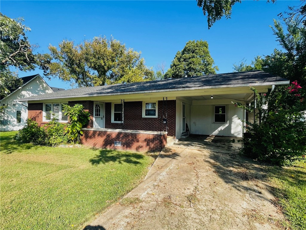 3BR, 2BA, brick home with 1 car attached carport, hardwood, appliances, CHVAC, great location just a couple blocks off the the Berryville Square.