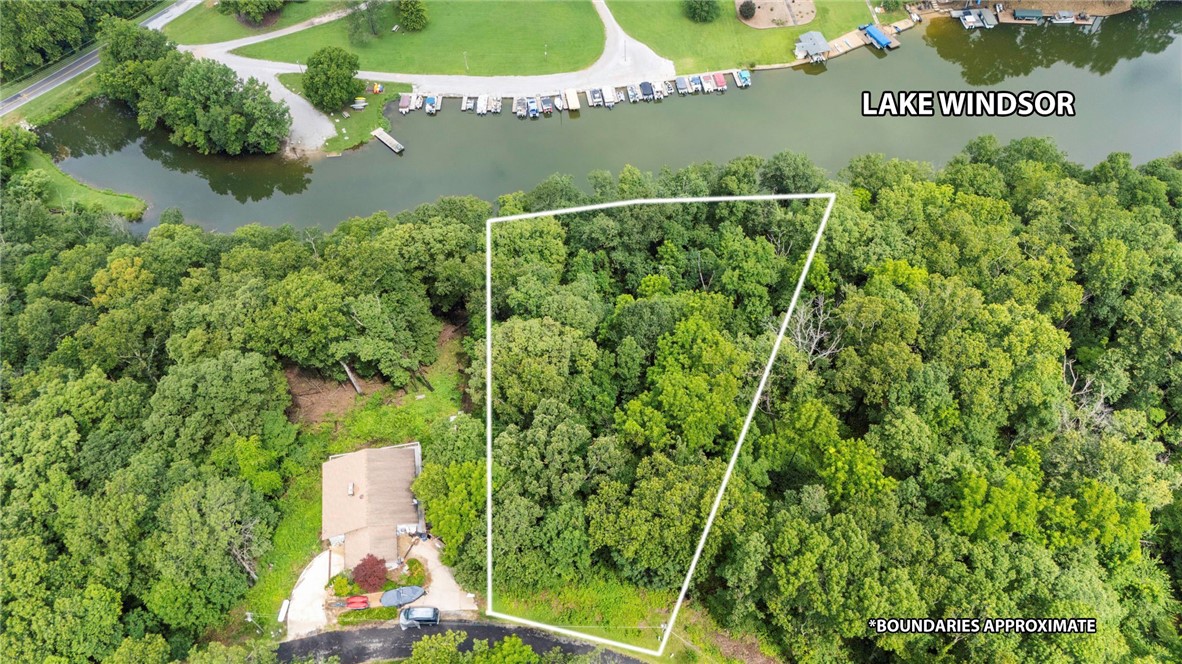 You know how hard it is to find lake lots and here is the one you've been waiting for! Over 250' of water front for you to build your lake house! Build your own dock or use the one just 3 minutes away.