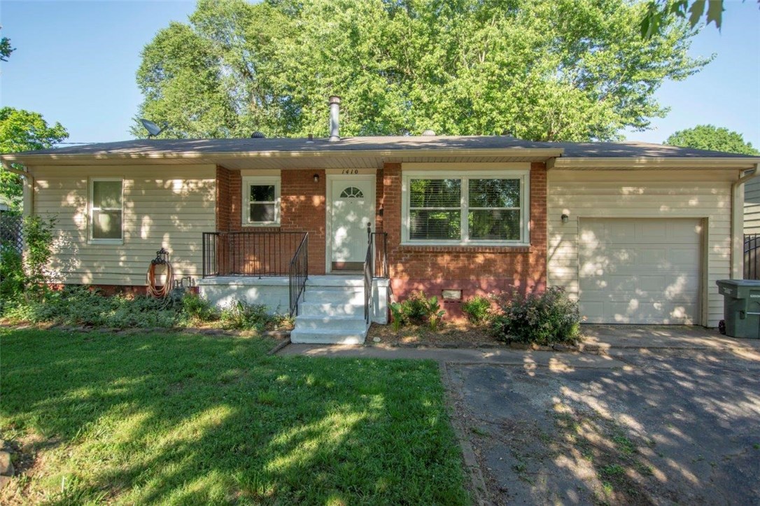 Walk to Baum Stadium from this classic Fayetteville charmer with original hardwood floors in bedroom, hallway, and living room. Updated windows. Rustic kitchen additions include custom wood bar and corrugated steel backsplash. Large backyard freshly seeded, dedicated garden space, and chicken coop. This lot is zoned RMF-24 (Multi-family) and is a great investment area in south Fayetteville. The backyard is easily accessible from easement on the east side of property. Hot water heater 08, insulation, vapor barrier, and gutters added 2014. Heat exchanges and Rheem two ton package replaced 2012.