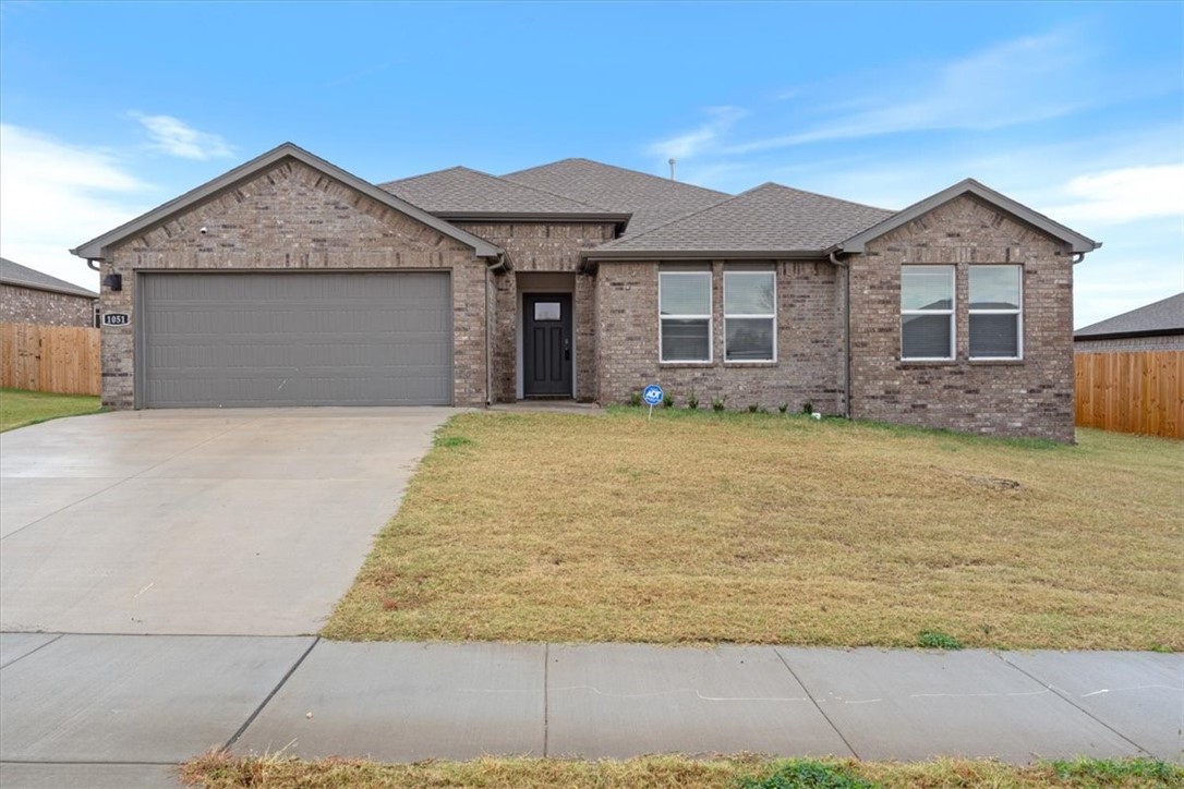 Save Thousands $$$- INCULDED in this price is Full Privacy Fence - Whole house gutters- Blinds and Stainless Appliances- already installed!!!! This beautiful home with its full brick exterior adds durability as well as curb appeal. With 4BR/2BA and 2,109 SF, it is spacious enough for a family. The large island and gas range in the kitchen are perfect for those who love to cook and entertain, while the formal dining area adds a touch of elegance. The split floor plan ensures privacy between the main suite and the other bedrooms, which is always a plus. The main suites walk-in-shower adds a modern touch, while the luxury vinyl plank flooring is stylish and durable. A separate utility room is convenient, and large closets provide plenty of storage space. The privacy fenced back yard with a covered patio creates a great outdoor space for relaxation or gatherings. FULL PRIVACY FENCE-STAINLESS APPLIANCES-GUTTERS AND BLINDS- have been installed- Save Thousands! Move in NOW!