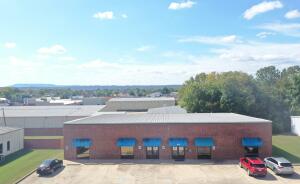 Commercial building in a prime location off East Parkway and across from the Post Office and just minutes from Wal Mart and Lowes, perfect for your business having high traffic and exposure. The space could be laid out for multiple suites and tenants.