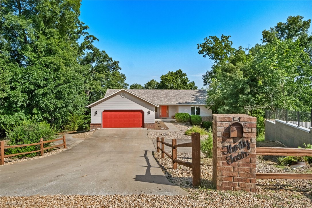 Take in stunning lake views every day from this 4-bedroom, 3.5-bath home perched above scenic Lake Ann. Built in 2001, this well-maintained property offers a spacious walk-out basement with a wet bar, abundant storage, and a dedicated workshopāperfect for outdoor gear or hobbies. Recent updates include a new roof and HVAC system, giving you added peace of mind. The backyard has been thoughtfully enhanced for low-maintenance enjoyment. Just minutes from the Back 40 mountain bike trails and Summit School, this is the ideal home base for outdoor enthusiasts who want the best of Bella Vista living with tranquil water views.