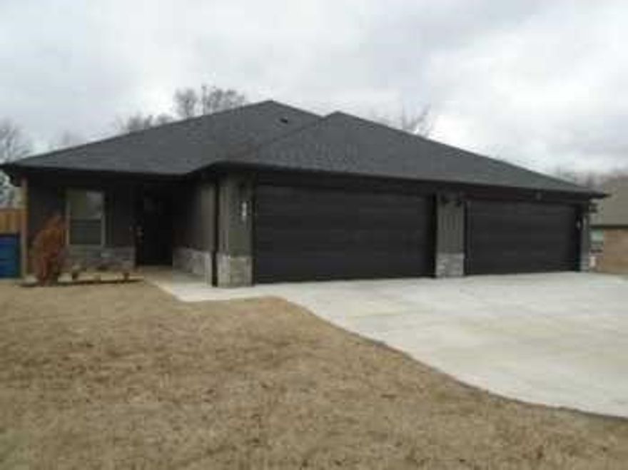 Ideally located in the heart of Gentry, just south of Main Street, this well-maintained duplex at 505 N Collins Ave offers a fantastic investment opportunity. Each side features 2,062 sq ft, 4 bedrooms, 3.5 bathrooms, an open-concept floor plan that flows seamlessly from the kitchen into the living area, creating a spacious and modern feel. Each unit boasts tile flooring throughout, no carpet, granite countertops, a large kitchen island, walk-in closets, central heat and air, & a custom interior design throughout. Conveniently situated just minutes from the park, library, and Gentry schools, and within walking distance to the McKee Plant, this property combines comfort with unbeatable accessibility. Whether you’re looking to expand your rental portfolio or live in one side and rent the other, this duplex checks all the boxes for location, style, and functionality. Each side is currently leased & leases will convey with acceptable offer, creating an opportunity for immediate income.