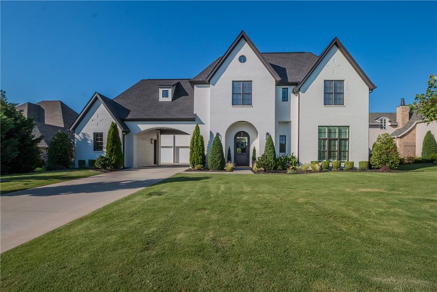 Exquisite custom design & luxury are uniquely embodied in this spectacular Pinnacle Country Club estate. Every detail was carefully selected & quality crafted for unparalleled living. This fabulous estate features 4 private bedroom suites with en-suite baths, open floor plan for entertaining, groin vault ceilings, high end fixtures & appliances, custom millwork, white oak hardwood floors & custom Rob Key steel doors & window walls. The kitchen is a modern chef's dream with floor-ceiling cabinetry, high end appliances, quartz countertops and a large center island. The adjacent, spacious great room boasts incredible windows overlooking the beautiful outdoor living spaces offering poolside alfresco dining. Enjoy time entertaining friends & family, in this resort-like private backyard oasis, featuring a covered veranda with a fireplace, a 378 sq. ft. pool house and sophisticated gunite pool with a sun shelf.