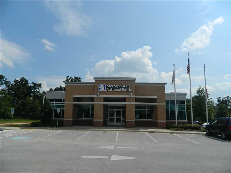 Ideal east Fayetteville location. Sleek, modern building with professionally decorated interior design. All furniture, fixtures, and equipment are included with exception of ATMs and personal computers.