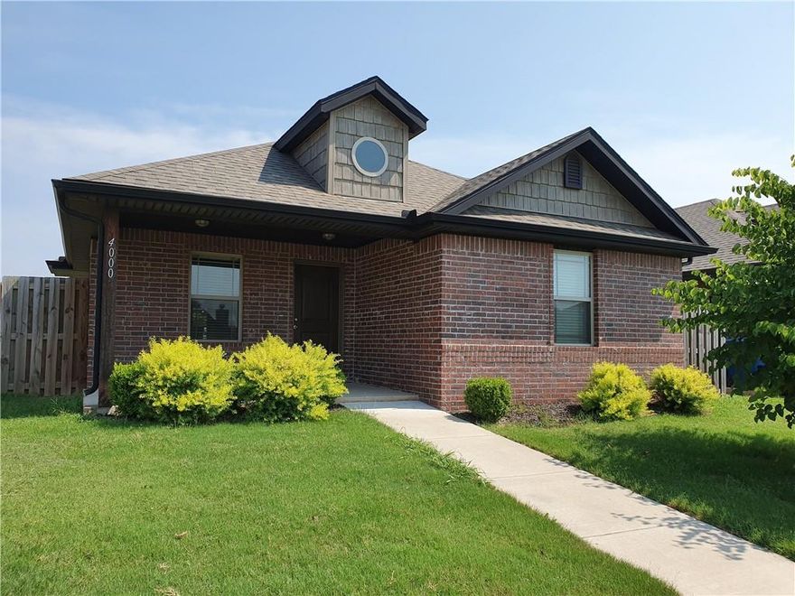 This three-bedroom, two-bathroom house is available for rent. It is located under four miles from the Wal-Mart Home Office and near local schools, restaurants, and shopping. The property features a larger floor plan with an open concept. The kitchen and bathrooms have granite countertops. Flooring is a mix of hardwood, tile, and carpet in the bedrooms. All appliances are included. Pets require owner approval and an additional deposit. No smoking.