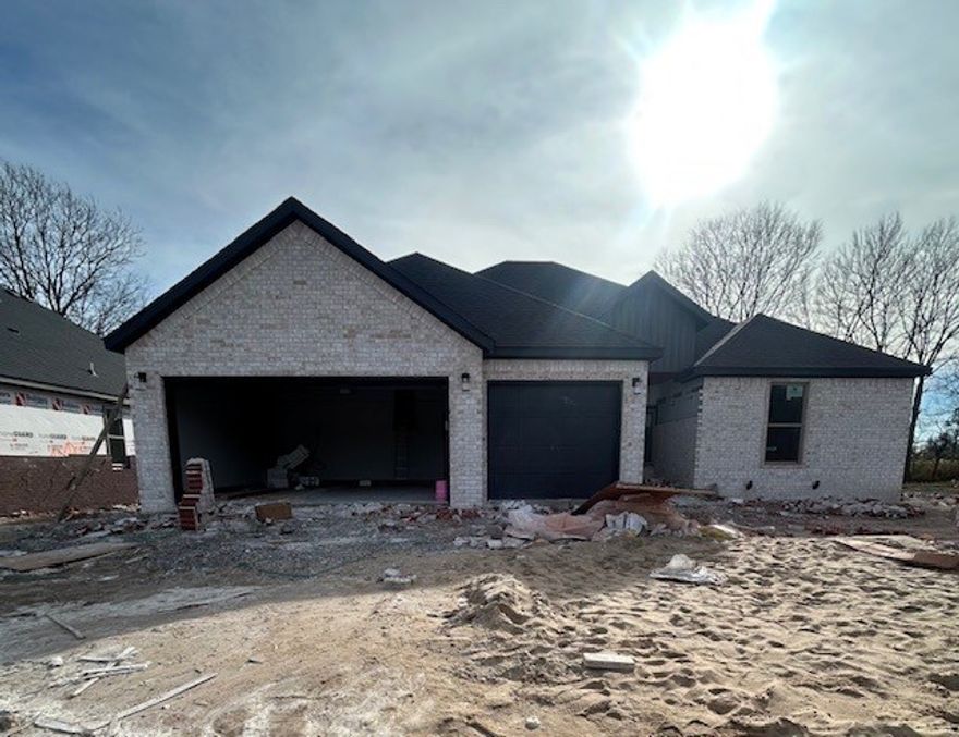 New year, new home! Welcome to this beautiful new construction home in Siloam Springs with a January 30th completion date! This thoughtfully designed 4-bed, 3-bath home offers 2,258 square feet of modern living space with quality finishes throughout. The exterior features classic brick construction, a 3 car garage, & an inviting curb appeal, while inside you’ll find luxury vinyl plank flooring, an open & functional layout, & abundant natural light. The kitchen is equipped with quartz countertops, energy star appliances, eat-in kitchen space, & ample cabinetry. Enjoy outdoor living on the patio. Don’t miss the opportunity to own this move-in-ready new construction home in a growing Siloam Springs neighborhood!