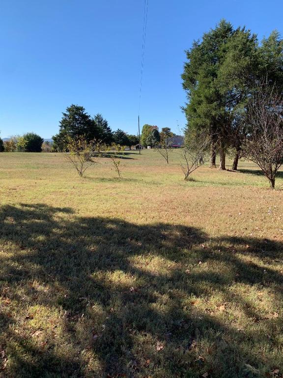 2.25 acres M/L of mostly cleared vacant land. Ideal for building a home. Property will be marked off of larger property by a new survey. Highway frontage for easy access. Rural water at highway, electric at highway - will need septic. This is a beautiful piece of ground with several building sites on acreage.