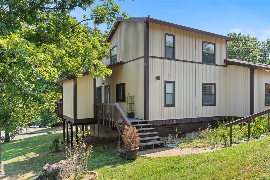 Awesome location for this Oak Point II Condos. This home offers 2 bedrooms both with private baths, nice sized living room with wood burning fireplace and tons of storage. So close to 9 hole golf course, rec center, swimming pools, pickle ball and tennis courts and mini golf. Start enjoying your lake getaway now!