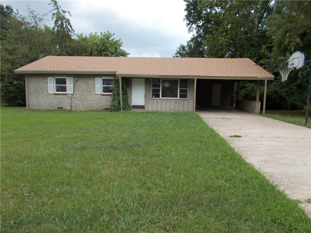 Extensive renovation on this 3 bedroom, 1 bath home very close to middle school, shopping & JBU. Move-in ready. New: Roof; windows; carpet; interior paint; light fixtures; A/c thermostat/blower; exterior and interior doors. Custom sized windows will be installed very soon from the listing date. New kitchen sink and faucet installed.