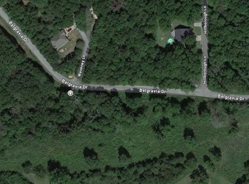 Discover serenity on this .25-acre wooded lot on Belgravia Dr., located within the Bentonville School District. With no neighboring lots on either side, this property offers unmatched privacy and the perfect setting for your dream home. Embrace peaceful living in a secluded, natural environment.