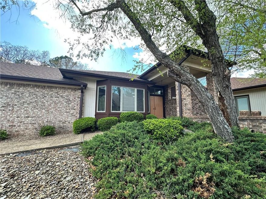 One level Townhouse in great location near trails, Kingsdale golf, tennis, pool, park, etc. Vaulted ceilings. Large primary bedroom suite with large walk in closet. Sunroom that can be used as an office. Wood burning fireplace in the living room. 2 car garage. Large Patio. Bella Vista Townhouse Association takes care of landscaping. Refrigerator, Washer and Dryer included but not warranted by lessor.