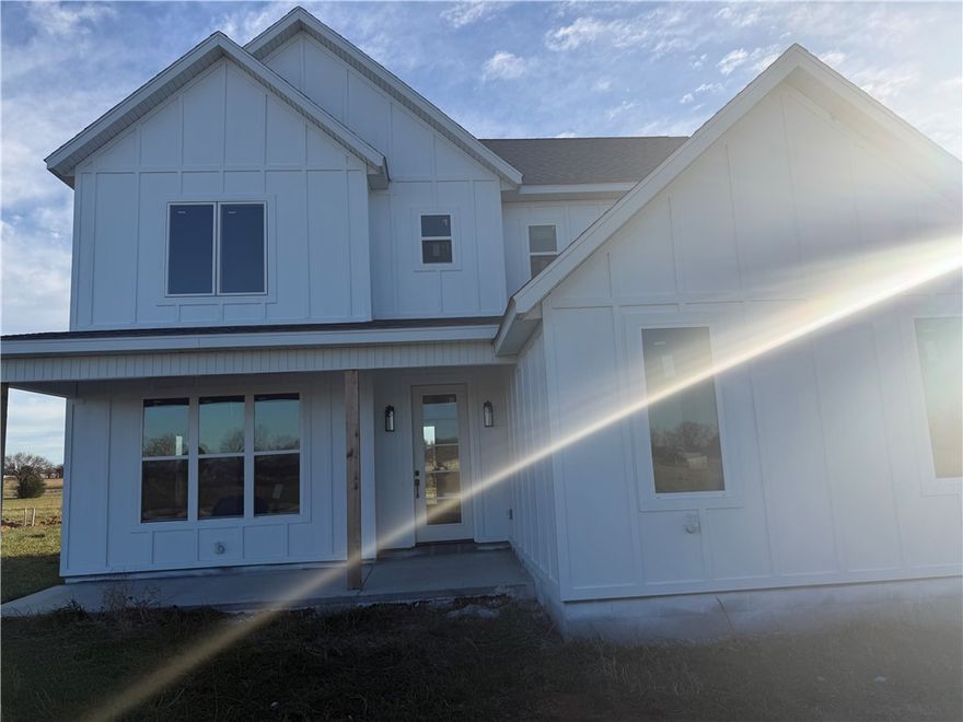 New Construction with tons of beautiful finishes, from flooring, fixtures, tiled wall shoer, back splash in kitchen, 4 spacious rooms with a guest master suite, 3 car garage, covered front porch, on one acre lot. More pics coming soon.