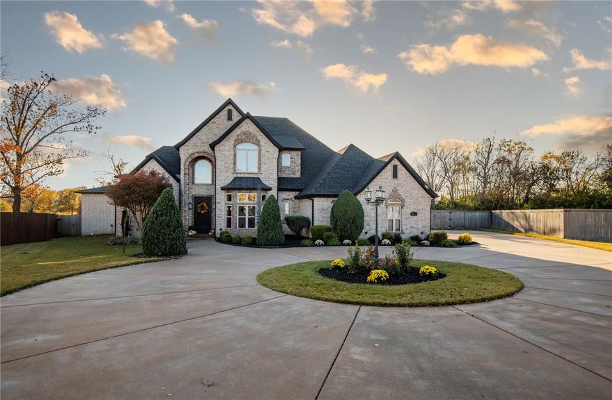 This home truly is one-of-a-kind! If you love to entertain, enjoy being outside with complete privacy all while being in a prime location in a sweet neighborhood in the heart of NWA, this home is waiting for you. With a contemporary remodel, this home went from great to GRAND! The layout encompasses a large entrance with a statement staircase, 5 bedrooms, 4.5 bathrooms, a dazzling kitchen, 2 laundry rooms, game room, bar area that walks out to the pool, workout room & plenty of living areas for relaxing & entertaining. This smart home powered by 'Control 4 System' has many features including a new roof in 2020, an 'Auto Mist Insect Control System', induction cooktop in the main kitchen, 'SimpliSafe Home Security', oversized windows & sliding glass doors offering natural light that will show off the most beautiful sunrises & sunsets. The salt water chlorination system pool can be enjoyed year around with the pool heater. The back patio is completely hooked up for a hot tub if you choose to have that.
