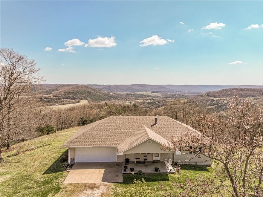 Modern 2-Bedroom Home on 34.53 Acres with Exceptional Views
Experience country living at its finest with this modern 3-bedroom, 2-bath home set on approximately 34.53 acres of scenic rolling land. Enjoy breathtaking bluff views,  and a pond located just across the road.
• All-electric home with a standing wood stove for efficient backup heat
• Tile and carpet flooring throughout
• Custom oak cabinetry and built-ins in the main bedroom
• Partial basement, clean and well maintained
• Shared well agreement in place
• Great garden area for homesteading or hobby gardening
• County road frontage for easy access
This property blends modern comfort with natural beauty — a peaceful retreat surrounded by bluffs, mature trees, and running water. Enough room for some animals. Properties like this are rare. Don’t miss the chance to see it—schedule your showing today!