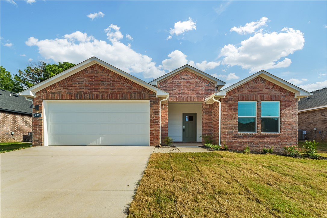 Welcome to this stunning 3-bedroom home located in the heart of Lowell, AR. Built in 2025, this property boasts a modern design with a beautiful open layout that allows for a seamless flow between spaces. The home features three spacious bedrooms and two full bathrooms, providing ample space for comfort and convenience. The kitchen is equipped with a gas range, perfect for those who love to cook. Central heat and air ensure year-round comfort. The home also includes a 2-car garage, offering plenty of storage space or room for your vehicles. Experience the perfect blend of style, functionality, and location in this remarkable home.