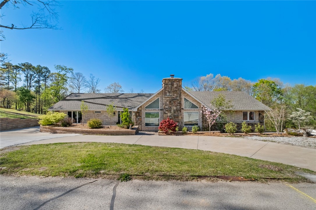 EXPERIENCE PRAIRIE CREEK at its fullest w/ this immaculate home; the home offers options to the growing family, college or in-law family, lake family or the entrepreneur looking for an investment w/multi-purpose, all options avail.! HERE IT IS! Two level(s) with the main level offering 3 BR (1 the primary suite with outside private patio), 2 bathrooms/laundry, open living area(s), mini-bar, amazing FP. The garage-now a private apartment with living quarters/full kitchen/1 bathroom/bedroom suite (no corner left incomplete) w/ outside access only. Outside the main floor is the partially covered back deck for outside entertainment/morning coffee w/ a lower area offering the salt water above ground/decked pool! Come back inside, let's visit downstairs! More options! Option to shut-off the stairway (for airbnb) OR to utilize more living space for your family. Downstairs offers an apartment w/ mini-bar, fireplace, kitchen/dining/living/bedroom/bath and priv. patio. w/ outside kitch/fire pt. Lake Life for ALL and Unique!