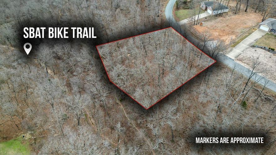 Lot in the heart of mountain biking trails! Nearby trails SBAT, Skip Town, and Flo Ride. Two rectangle lots totaling .56-acres, perc tested for up to 3-bedroom home, new home construction nearby, Bentonville School District, Near Lake Ann & Lake Brittany, Dogwood & Brittany golf course 3.2-miles away, Enjoy Amenities of Bella Vista POA Lot monthly fee $16 - allows access to (7) Lakes, (6) Golf Courses, (2) Outdoors Swimming Pools, (1) Indoors Swimming Pool, (3) Workout Centers, Tennis Courts, Pickleball Courts, Disc Golf, Gun Range, Golf Driving Range, Walking Trails, 100 Miles of Mountain Biking Trails, (1) Sandy Beach, Pro Golf Shops, Fishing Docks, and much more.