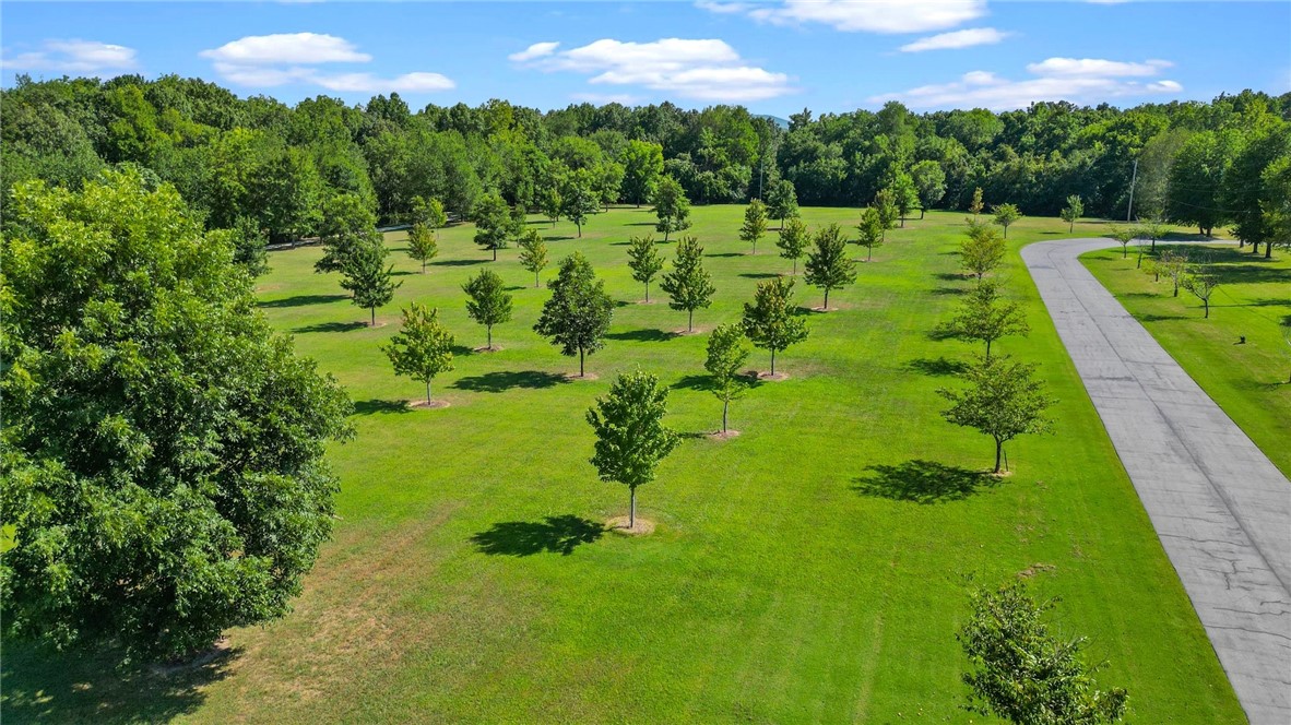 Sanctuary on 8.4+/- Acres! This West Fayetteville land is the perfect location to build a dream estate, just 10-15 minutes from the heart of the U of A campus. Flat and ready to use, the well manicured space is a breath of fresh air waiting its new owners. Take advantage of this rare opportunity to design your own private retreat! See listing #1255677 for adjacent home & 2 acres!