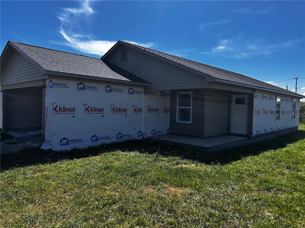 This new construction is not a custom home. Near a subdivision, less than .5 miles from a park, sidewalk the entire way.
