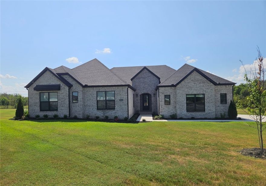 Sensational Shelby Plan with 4 Bedroom, Study, 3.5 Bathroom and a 3 Car Garage!  Fabulous kitchen open to living room.  Luxurious Bedroom One with a fabulous en suite bathroom with a Walk-in Shower and Soaking Tub.  Kitchen boasts cabinet to ceiling cabinets, quartz counters, farmhouse sink and Kitchen Aid Stainless Steel Appliances with double ovens!  Black fixtures! LED Lighting! Ceiling fans!!  Mix of Brick and Hardie board exterior per plan. Asher's Ranch is an idyllic community nestled in the heart of Goshen, Arkansas, known for its picturesque landscapes and serene surroundings. The community boasts meticulously designed and built homes that are situated on expansive lots, with ample space for outdoor activities, gardening, and privacy. The homes are crafted to perfection, featuring modern amenities and elegant finishes that exude luxury and comfort. Come to Asher's Ranch and find your dream home today! Taxes TBD.