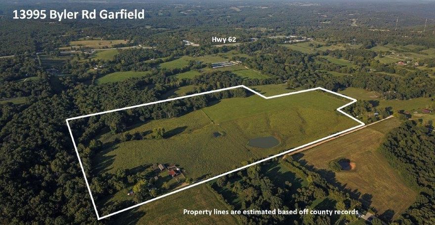 72+ Acres of Beautiful Land in Garfield. Large pasture space for livestock and farming with 4 ponds on site. Wooded area offers great hunting locations as well. Property features multiple outbuildings, barn, 3-bedroom home (sold as is), and fencing. This property sits in a fantastic location off Hwy 62 but set back in a secluded setting. Easy commute to Rogers. Abundant potential available with this property, don’t miss out!
