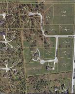 Very nice subdivision with curbed and paved streets, underground utilities and ready to build on. Wooded and has basement potential. Covenants and plat in documents.