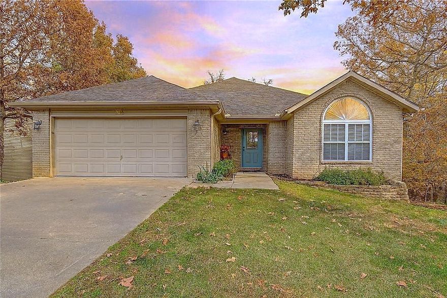 Discover refined comfort in this beautifully designed home featuring a thoughtful blend of style & function. The primary suite and an additional upstairs bedroom (ideal as a private office) offer serene spaces, while two spacious downstairs bedrooms provide flexibility for guests or family. Enjoy dual living areas, perfect for teens, entertainment or watching the big game!  Recent upgrades include new roof 2023, new HVAC, new carpet, new hot water heater, & new stove for peace of mind. The primary suite impresses with deck access and large walk-in closet. A finished, heated/cooled basement storage room provides the perfect spot for bikes, kayaks, or hobby shop. Relax on 1 of 2 decks! With its modern updates, ample space, and connection to sewer, this home effortlessly combines elegance, comfort, and practicality. Being in the heart of Bella Vista this home is close to mtn bike trails, fishing, golfing, kayaking & so much more!  Not to mention the new bike lift that is being built!