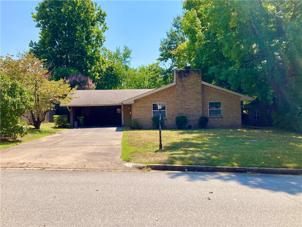 Looking for a well-built, 1960's style with some original features still in place? Come see this 1969 high-gabled, brick ranch in a beautiful, established neighborhood near schools, parks and Greenway! New Lennox HVAC, new hot water heater and two-year old roof. Now it needs your cosmetic updates for flooring and paint. You decide what to preserve & what to update. Lots of great original items including interior wood doors, front door, several lighting fixtures, hardware, tile, cabinetry, decorative woodwork, wallpaper, & wood paneling. The living room features a wood-burning fireplace w/gas logs, large brick hearth & wood mantle. There's a built-in butler pantry between kitchen/dining that you'll love for entertaining and storage. Great floor plan has nicely-sized rooms, walk-in master closet and a bonus space for an office or storage. Large, private backyard . Original clothes line poles are still in place if you want to re-string and enjoy fresh air-dried laundry! Attached backyard storage room. Selling As-Is.