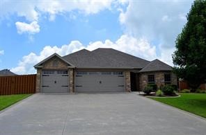 Rental opportunity in Riverwalk! This open concept 4 bedroom 2 bath property with three car garage has walk-in closets, rope lighting, central vac, and many more features. Zoned for Osage Elementary. Community pool and large green space with a playground are within walking distance. Agent Owned.