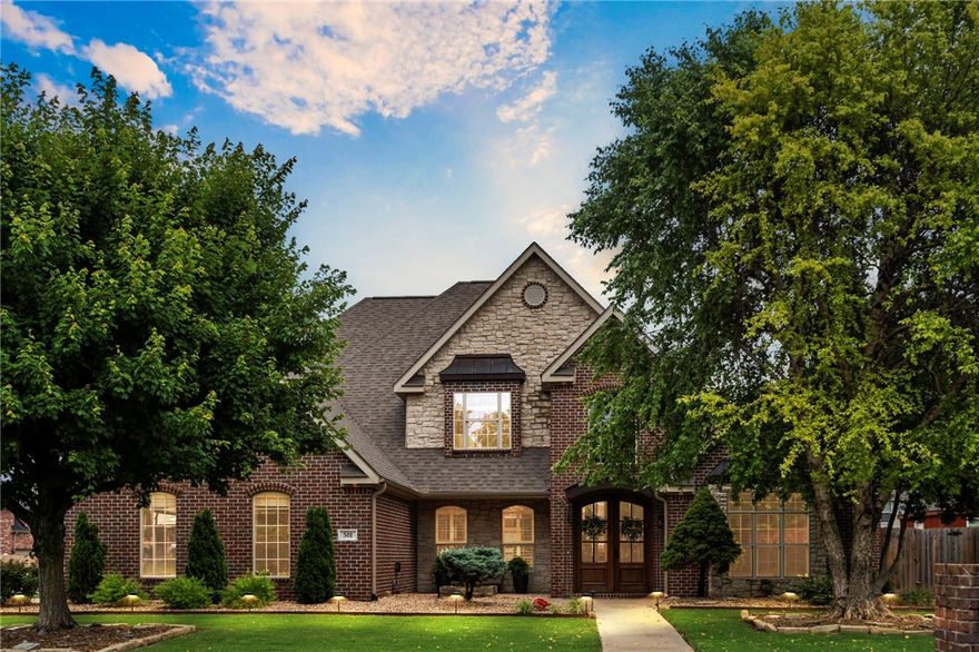 Stunning corner-lot home just 1.9 mi to new Walmart HQ, 2.5 mi to Downtown Bentonville, & mins to trails, parks, NWACC & Crystal Bridges! Immaculate 4BD/3.5BA w/ soaring ceilings, a gorgeous wall of windows that fill the space with natural light, & lush landscaping w/ 2 custom fountains. Gourmet kitchen ft. Fisher & Paykel Gas Stovetop, a Double oven, island, Granite counter tops & walk-in pantry. Spacious owner’s suite, dedicated office, & a large covered patio overlooking the private, beautifully landscaped yard. Side-entry 3-car garage, wood, tile & carpet flooring. New water heater 06/2025 New Pella windows in Kitchen and Breakfast nook, New Pella French doors in Living.Move-in ready w/ updates throughout. A rare find in one of Bentonville’s most desirable locations!