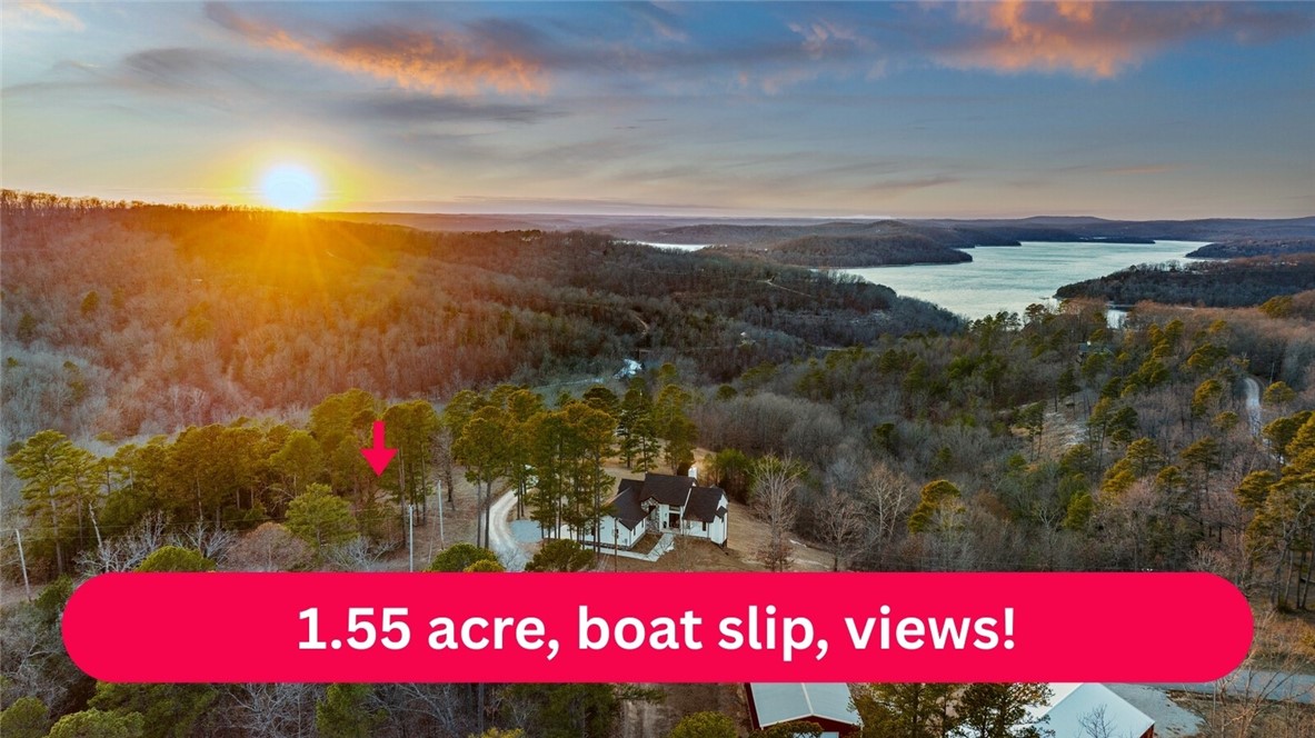 MOTIVATED SELLER!
Picture it: Beaver Lake 2026.
You wake up in your newly built home on the incredible 1.55 acre lot you purchased in 2025. You look out at the gorgeous, expansive view over the lake and pinch yourself. You ponder your options:
Do you hit the lake from your boat that’s waiting in the boat slip that conveyed with the lot? You’re a short ride to Starkey, Hogscald or party cove!
Or go for a swim and float off the community dock in the beautiful, calm deepwater cove?
Do you rent it out for the weekend to recoup expenses? STRs/AirBNBs allowed and renters can swim from shore or put a boat in at Big Clifty ramp, 5 min away!
Do you travel down the road for a fun afternoon in Eureka Springs? It’s a gorgeous little paved drive.
Or visit with your lovely (but not too close) neighbors and take a golden hour cruise? There’s a great mix of full-time and part-time residents, adorable cabins and larger upscale homes.
The possibilities are endless and you really have to see it for yourself!