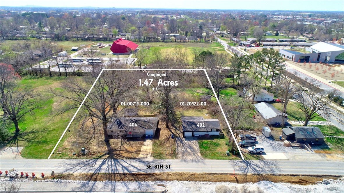 Prime location, Development opportunity! Downtown Core zoning. Two parcels on SE 8th St, totaling 1.47 acres. Both lots face SE 8th St close to the downtown square, art museum, and new corporate campus. 8th Street improvements are underway. Each parcel has a house on it, neither has any value. Property is also listed as commercial mls# 1270362