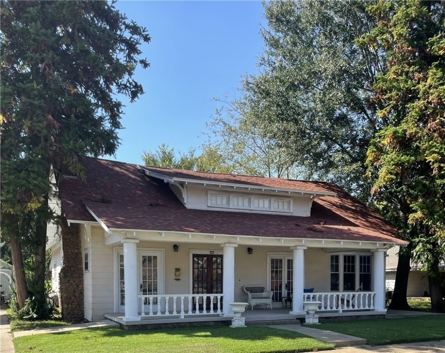 Gorgeous historic home in peaceful "Southtown" Clarksville! Walking distance to downtown businesses, coffee shops, library, walking/biking trails, doctors, courthouse. This beauty is loaded with turn-of-the-century character and charm, but has all the conveniences of today! Original oak floors and TONS of solid oak doors and woodwork throughout. Lots of original hardware. Must see to appreciate! Every room is flooded with natural light! NEW roof; NEW water heater; NEW gas furnace; (NEW refrigerator and NEW washer plus dryer and range to convey with acceptable offer.) Luxury vinyl tiles in some rooms. 2-car det.carport. Shed to have new roof. 3 patio slabs. Lovely backyard with an impressive handmade pergola on the patio is the perfect place for the adults to hang out while the kids roast marshmallows at the firepit! Enjoy your morning coffee while watching the sunrise from your front porch with those grand columns! The cozy sunporch overlooking the backyard is perfect for your rocking chair and a good book.