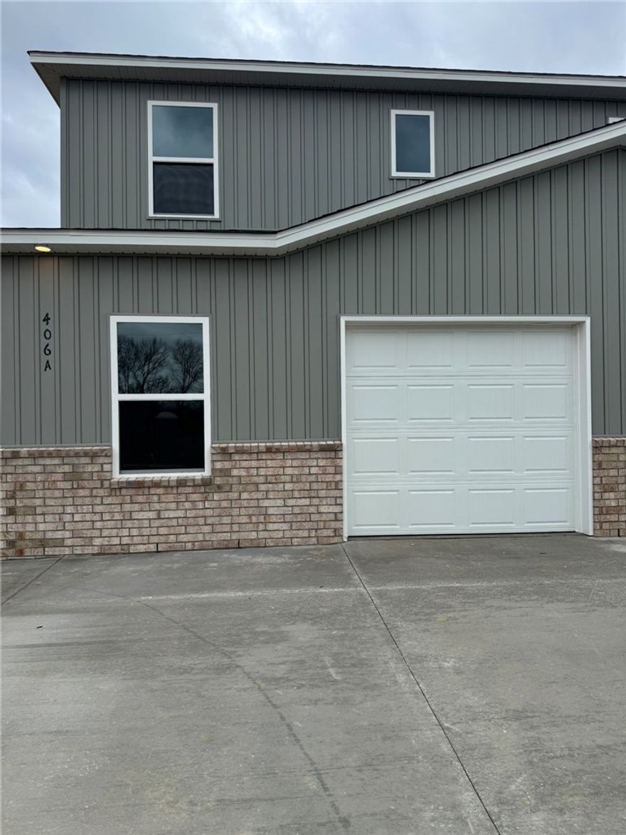 Introducing The Elmstead, a beautiful two-story duplex located in a vibrant, new community. This modern home offers 3 spacious bedrooms and 3 bathrooms, featuring a flexible layout that suits a variety of lifestyles. Upstairs, you'll find the serene master suite, complete with a private bathroom and ample closet space. An additional bedroom and bathroom are also located upstairs, providing comfort and privacy for family or guests. The lower level features a third bedroom with its own full bathroom, perfect for visitors, a home office, or a private retreat. The open-concept living area on the main floor is perfect for both relaxing and entertaining. The well-appointed kitchen includes modern appliances, generous counter space, and plenty of storage. With a one-car garage offering secure parking or extra storage, The Elmstead combines practicality with style. Situated in a brand-new community, this home is conveniently located near local amenities, parks, and schools. The Elmstead is the perfect place to call home.