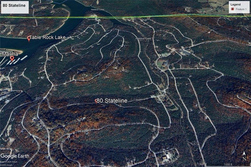 Ready to build your dream home?  Quiet and gently wooded, this elevated lot offers the best of both worlds. Enjoy the amenities in Holiday Island like golf courses, a country club, swimming, tennis and a marina with a fishing dock or watch the local fauna from your front porch! Nearby Eureka Springs or Rogers offers great shopping and vibrant cultural hubs