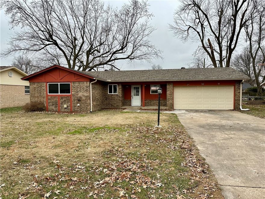 New paint, flooring, and kitchen countertops in this 3 bed, 1 bath home with two car garage and large fenced yard. Great central Springdale location near schools and shopping. Refrigerator included, no smoking, pets negotiable.