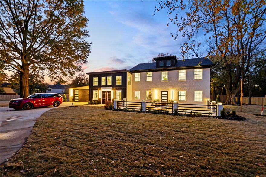 Modern Luxury Venue Minutes From Walmart HQ !!! A stunning blend of modern design and craftsmanship, this newly built Beauty4Ashes estate is perfectly suited for a high-end event center just minutes from the Walmart Campus and Downtown Bentonville.
A private gated entry leads to a serene courtyard with a modern water feature. Inside, a dramatic two-story great room and chef’s kitchen with Thermador appliances create an impressive setting for weddings, corporate events, and private gatherings.A luxury main-level suite serves as an ideal bridal or VIP lounge, while the upstairs ensuite offers additional guest or hosting space.The resort-style deck with fireplace provides year-round indoor–outdoor event potential.Elegant, modern, and centrally located—this property is ready to become Bentonville’s premier event destination.