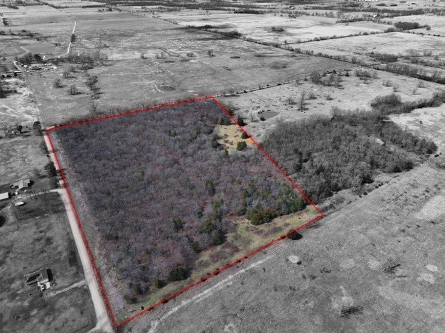 25 acres of Wooded Ozark Beauty. Countless home sites. roads on 2 sides. Rural water at street. Bring your chainsaw and build your dreams.