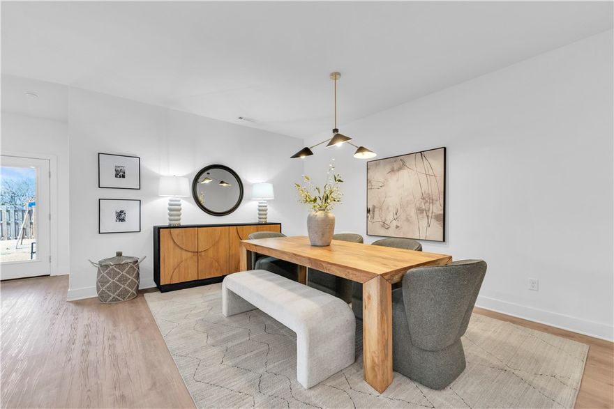 Barely lived-in new construction built in 2024 and ready for new owners. Better than new with wood floors throughout, upgraded designer light fixtures, and custom built-in cabinetry in the laundry room. Conveniently located near Pea Ridge schools, I-49, and the Walmart Home Office.