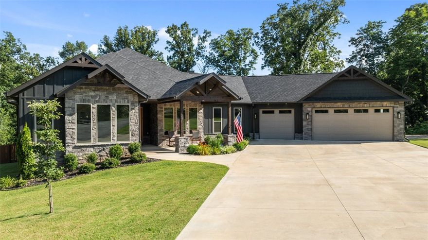 A Nature-Lover’s Dream with Custom Finishes on 1.05 acres! Step into this custom-built sanctuary where architecture meets the outdoors. This stunning 3-bedroom, 2.5-bath home is thoughtfully designed with walls of windows that flood the interior with natural light & serene views of the surrounding trees. Nestled on three lots totaling just over an acre, you’ll enjoy privacy, space, & a true connection to nature. Inside, you’ll find gorgeous finishes & carefully curated details, from the grand Kitchen Island & your very own Coffee Bar to the Spa-like Bathrooms, Every detail has been considered to create a home that’s both beautiful & functional. Enjoy peaceful mornings on the deck, entertaining in the open-concept living area, or tinkering in the oversized 3-car garage, this home offers a perfect blend of function & sophistication. Located just minutes from Highlands Golf Course & the sparkling waters of Loch Lomond, don’t miss this rare opportunity to own a one-of-a-kind retreat! Home is on 2-Bedroom Septic.