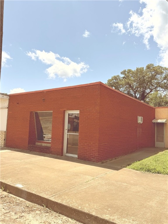 A commercial building is available for sale in the heart of Ola for just $17,000. Located directly across from Ola City Hall, this property sits in a high-traffic area, making it an ideal spot for a new or growing business. With great visibility and consistent drive-by exposure, it offers excellent potential for retail, office, or service-based operations. Seller financing is available, making this an accessible opportunity for entrepreneurs and investors alike. The property is being SOLD AS IS